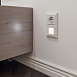 Розетка с заземлением и шторками белая WL01-SKGS-01-IP44 - фото